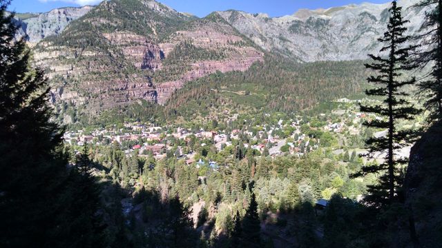 Scenic View of Mountain Village Surrounded by Forest - Download Free Stock Images Pikwizard.com