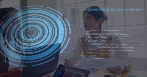 Colleagues Collaborating with Hi-Tech Interface in Office Environment