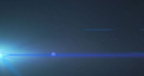 Blue Lens Flare on Dark Background for Exciting Effect - Download Free Stock Images Pikwizard.com