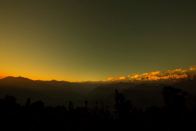 Majestic Mountain Range at Sunrise with Golden Sky - Download Free Stock Photos Pikwizard.com