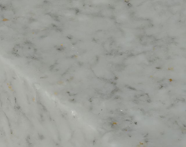 White marble texture with subtle gray veining can be used for backgrounds in graphic design or as a texture overlay. Ideal for use in interior design projects, websites, brochures, and as a sophisticated backdrop for products. Provides an elegant and natural appearance.