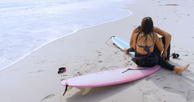 Couple Sitting on Beach with Surfboards - Download Free Stock Images Pikwizard.com