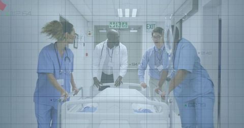 Medical Team Pushing Gurney in Hospital Corridor Emergency Response