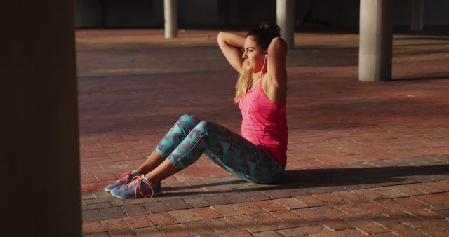 Young Woman Exercising with Sit-Ups Outdoors in Sunlight - Download Free Stock Images Pikwizard.com