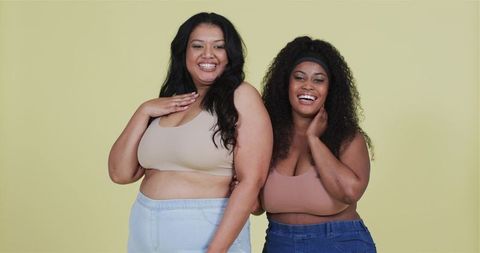 Happy friends embracing body positivity and diversity