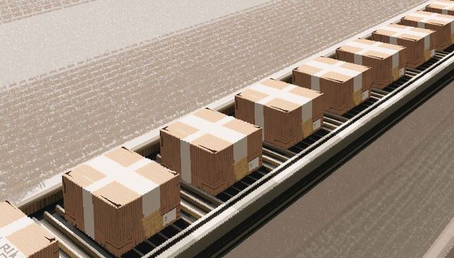 Automated conveyor with sealed cardboard boxes rolling through modern warehouse logistics