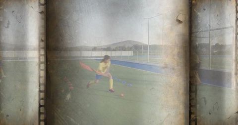 Teen field hockey player dribbling through cone drill on turf with vintage film overlay