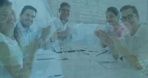 Office Team Applauding Successful Business Presentation