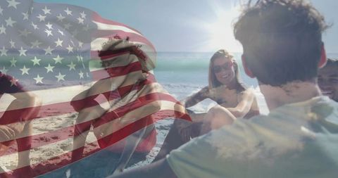 Friends relaxing on sunny beach with american flag overlay celebrating summer patriotism