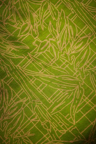 Green bamboo leaf pattern on textile