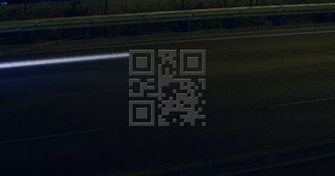 Glowing QR Code Over Highway Light Trails