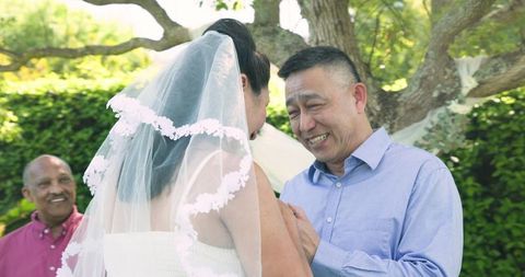Senior Bride and Groom Sharing Wedding Moments