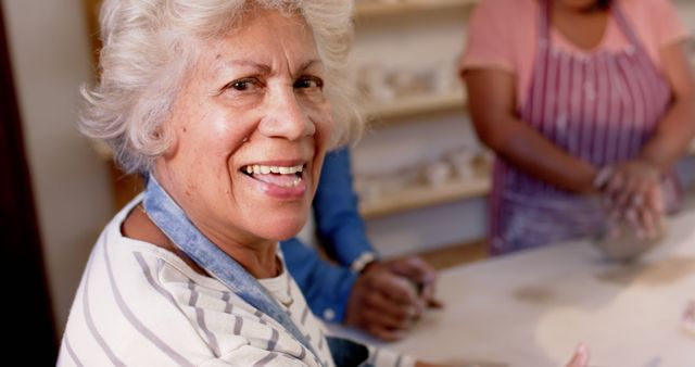 Smiling Senior Woman Enjoying Pottery Class - Download Free Stock Images Pikwizard.com