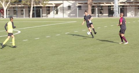 Soccer match with athletes showcasing teamwork and intensity