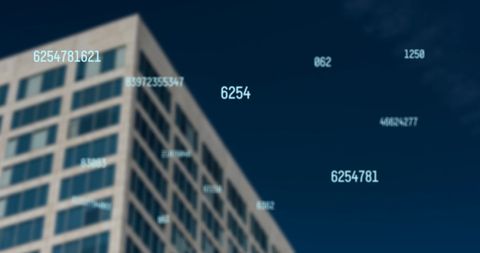 Digital numbers overlaying tall building against blue sky