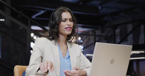 Businesswoman Conducting Video Call in Modern Office