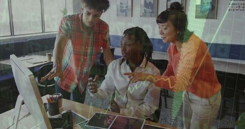 Team of Diverse Professionals Collaborating on Project in Modern Office