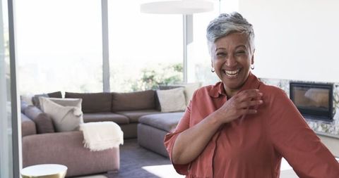 Joyful Woman Relaxing in Modern Living Room