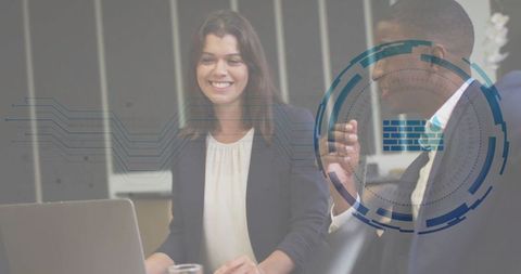 Professionals collaborating on network security innovation in modern boardroom