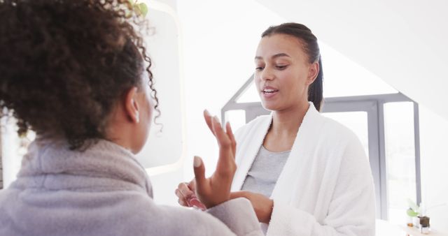 African American Women Morning Routine Skincare in Bathroom - Download Free Stock Images Pikwizard.com