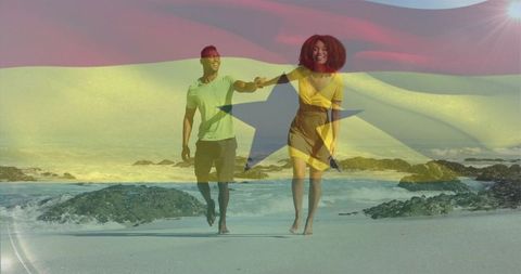 Romantic couple walking barefoot on sunny beach with ghana flag overlay promoting travel