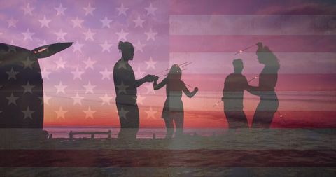 Celebratory Festivities with Silhouetted Group at Sunset