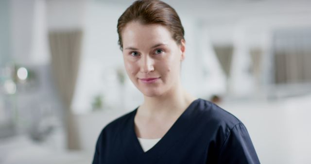 Confident Female Nurse in Modern Healthcare Facility - Download Free Stock Images Pikwizard.com