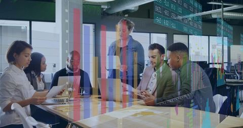 Diverse Team Collaborating on Business Strategy with Analytics