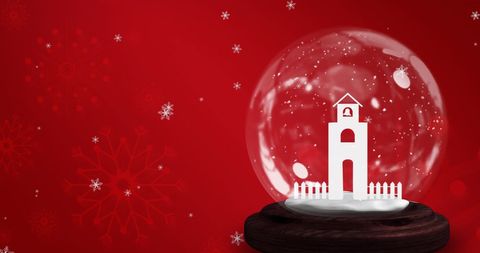 Magical christmas snow globe with falling snowflakes