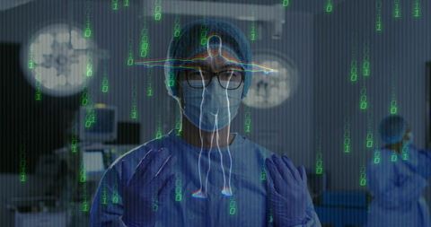 Surgeon Using Holographic Technology in Operating Theatre