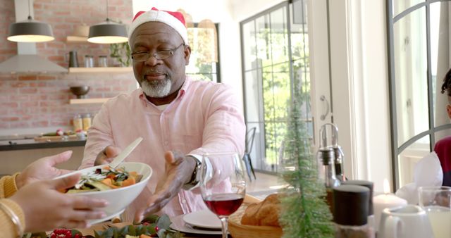 Senior Man Enjoying Christmas Dinner with Family - Download Free Stock Images Pikwizard.com