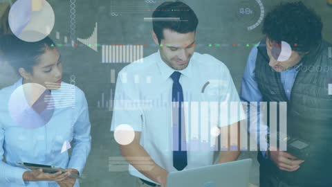 Warehouse Team Managing Financial Data on Laptop