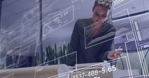 Architect Analyzing Scale Model in Tech-Driven Studio Environment