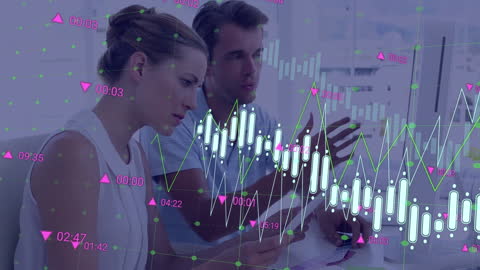 Business Professionals Analyzing Data with Graphical Interface