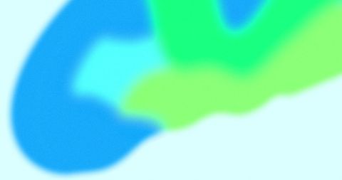Out of focus abstract green and blue shapes on blue background