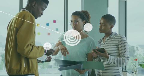 Diverse Business Team in Tech Communication Meeting