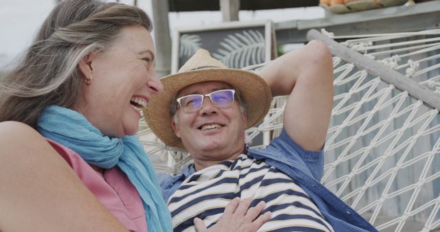 Happy Senior Couple Relaxing in Hammock on Beach Vacation - Download Free Stock Images Pikwizard.com