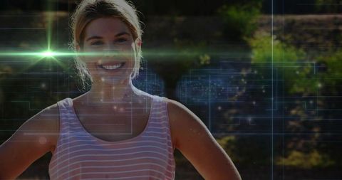 Smiling woman on sunlit hill with futuristic hud overlay and green lens flare, ar portrait