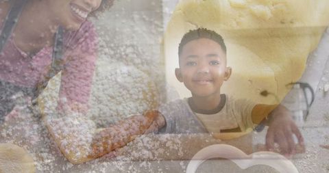 Mother and Son Baking Joyful Together in Kitchen