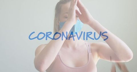 Woman Meditating with Face Mask during COVID-19 Pandemic