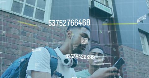 Young Male Friends Engaged in Smartphone Data Analysis