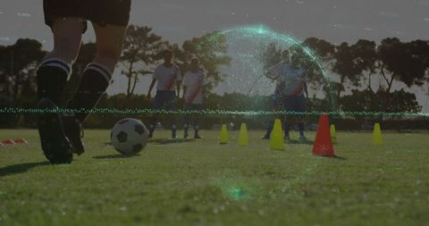 Soccer Player Dribbling in Evening Training Session