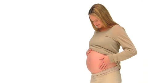 Happy Pregnant Woman Using Maternal Gaze