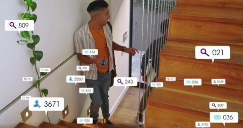 Young man gesturing on modern staircase with augmented reality notification overlays