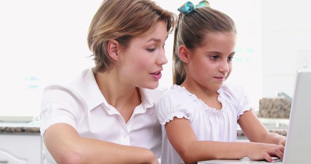 Mother and Daughter Using Laptop Learning Together at Home - Download Free Stock Images Pikwizard.com