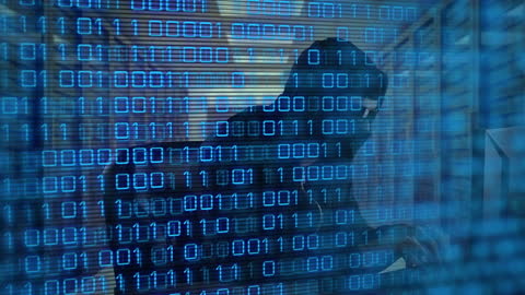 Cybersecurity Concept with Binary Code and Digital Silhouette