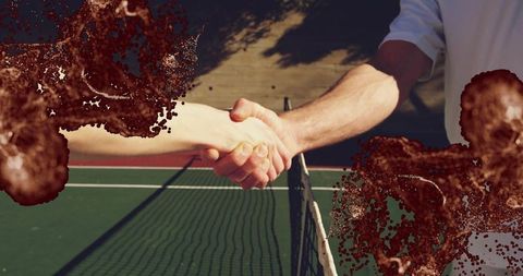 Tennis players shaking hands on court emphasizing sportsmanship