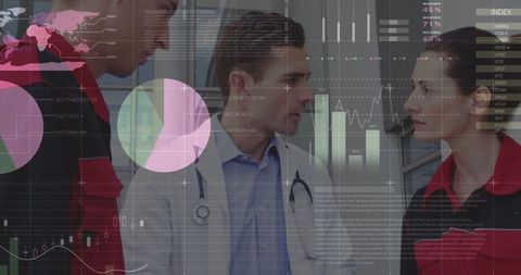 Multiracial Medical Team Analyzing Data in High-Tech Hospital Environment