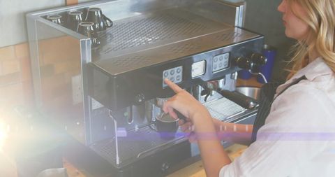Barista Operating Coffee Machine with Artistic Light Effects
