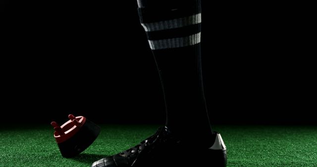 Close-Up of Soccer Player's Foot in Cleats and Socks on Field - Download Free Stock Images Pikwizard.com